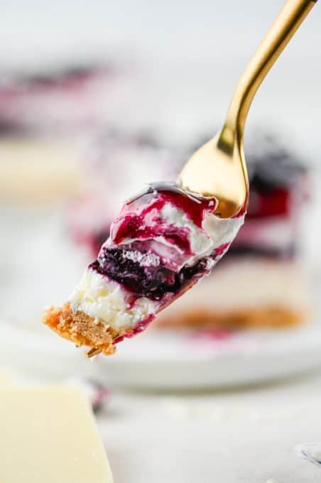 A forkful of No Bake Blueberry Dream Bars.