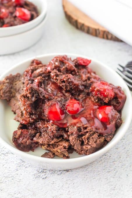 Cherry Pie filling, chocolate cake mix, butter and chocolate chips make a dump cake.