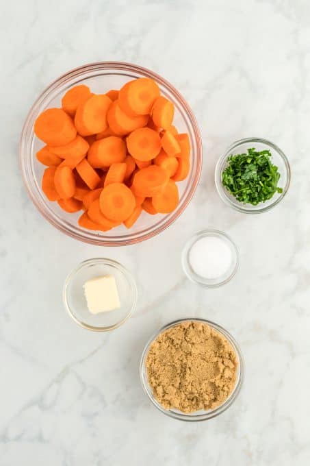 Ingredients for fresh carrots with brown sugar.