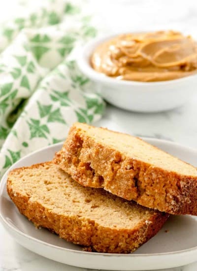 Two slices of a quick bread made with peanut butter.