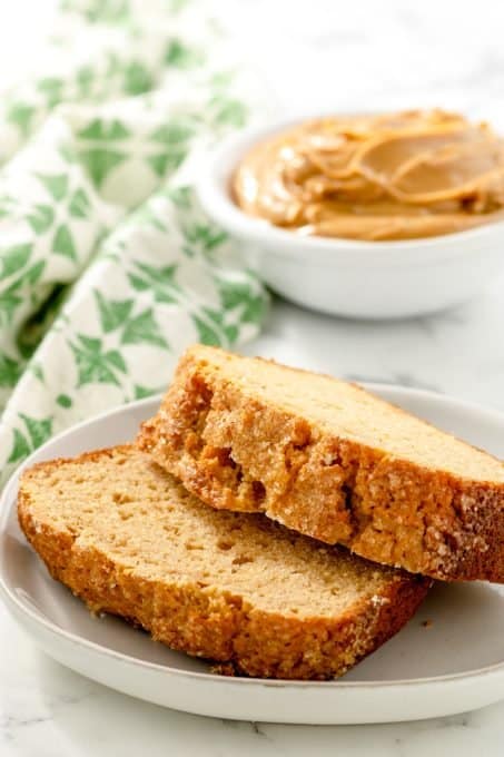 Two slices of a quick bread made with peanut butter.