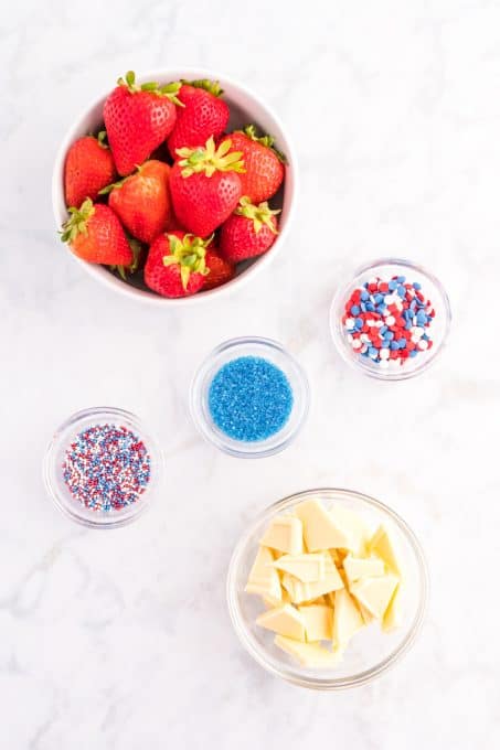 Ingredients for Strawberries with red, white and blue sprinkles