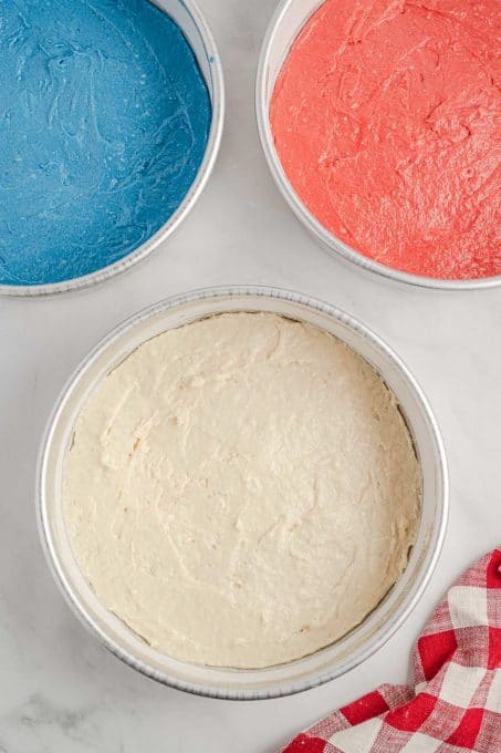 Red, blue, and white cake batter.
