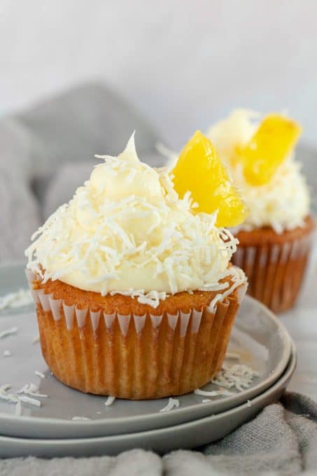 Cupcakes with pineapple and coconut frosting