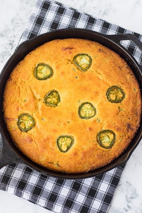 A skillet with Jalapeño Cheddar Cornbread.