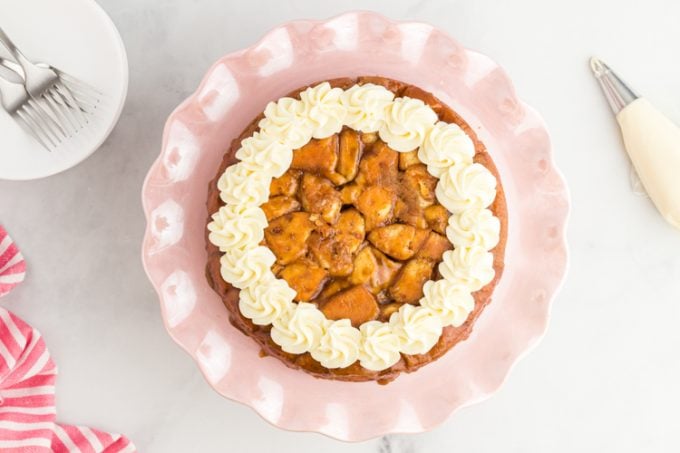 A finished cinnamon cake on a cake plate 9top view).