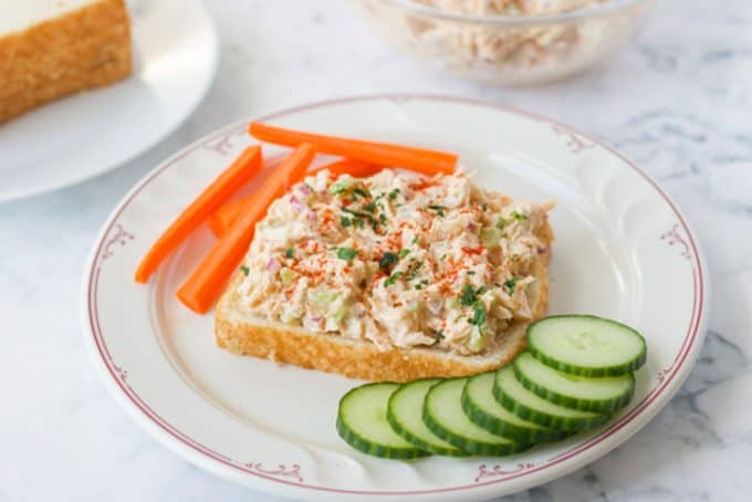 An open faced chicken salad sandwich with miso.