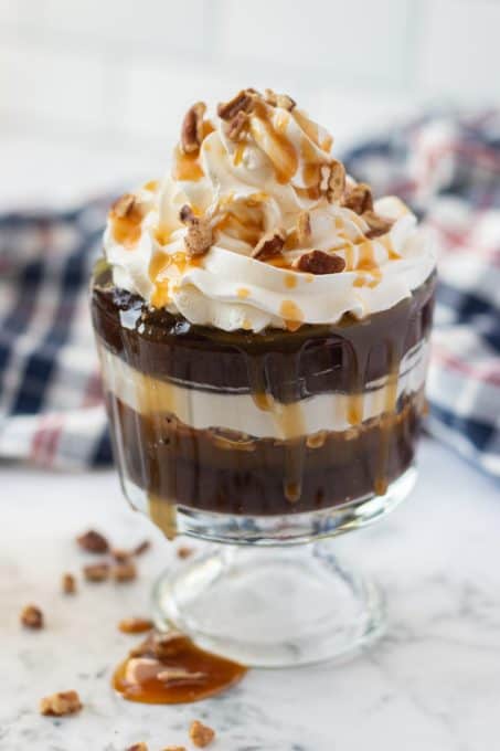 Chocolate Pudding made with tofu, caramel, pecans and whipped topping for an easy and fast dessert.