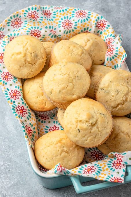 A pan full of muffins made from lemon and zucchini.