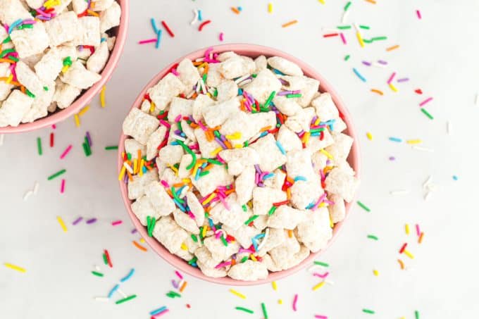 Puppy Chow with a Funfetti flavor and sprinkles.