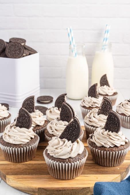 Oreos on top of chocolate Oreo cupcakes.