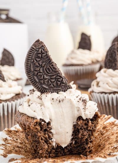 An Oreo Cupcake with Oreo Cream Cheese frosting on top and inside!
