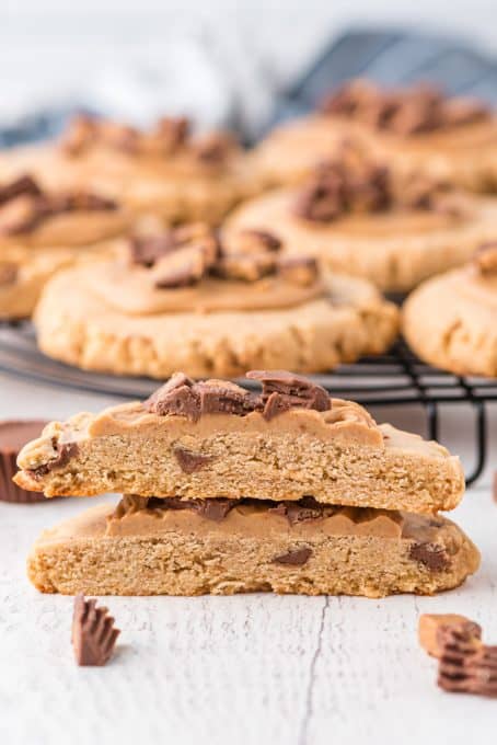 The inside of a peanut butter cookie with chopped Reese's Peanut Butter Cups