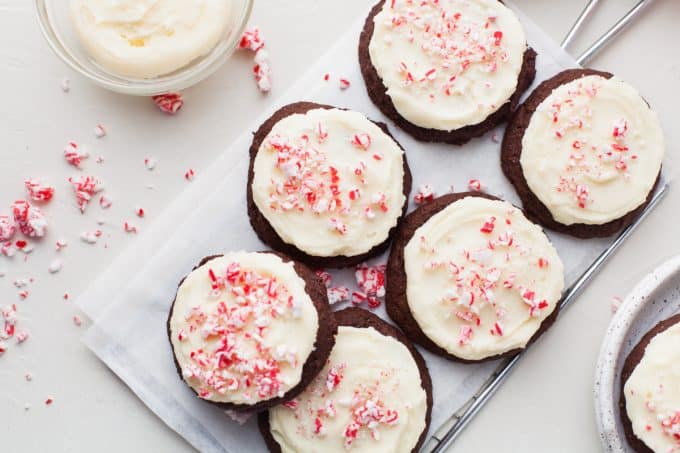 Peppermint frosting on chocolate cookies.