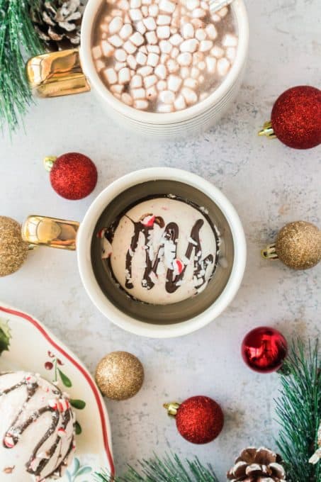 A bomb for hot chocolate with peppermint and instant coffee in a mug.