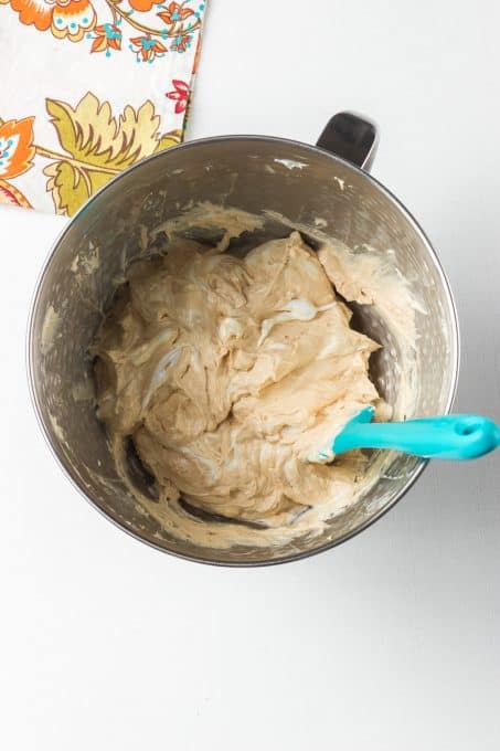 Making a peanut butter dessert dip.