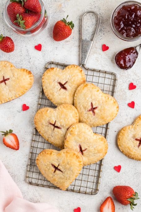 Heart shaped hand pies filled with cream cheese and homemade strawberry jam.