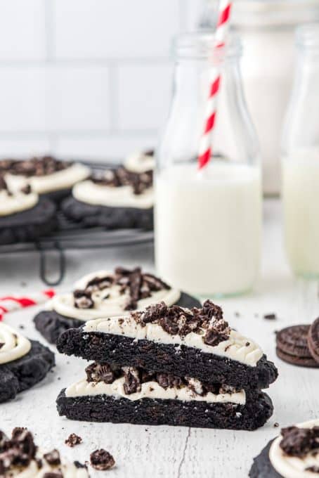 A copycat Oreo cookie from Crumbl broken in half.