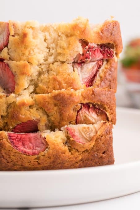 Strawberries in a loaf of banana bread.