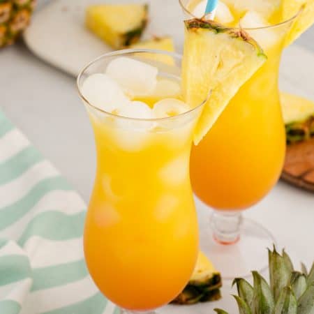 An ice cold cocktail made of rum, orange and pineapple juices.