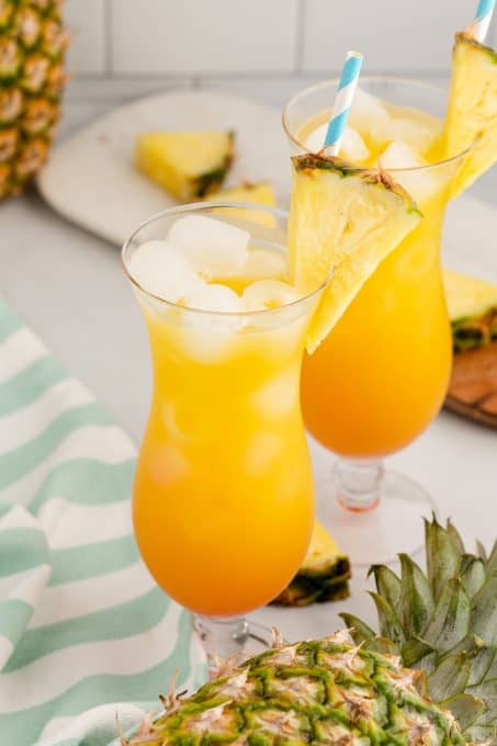 An ice cold cocktail made of rum, orange and pineapple juices.