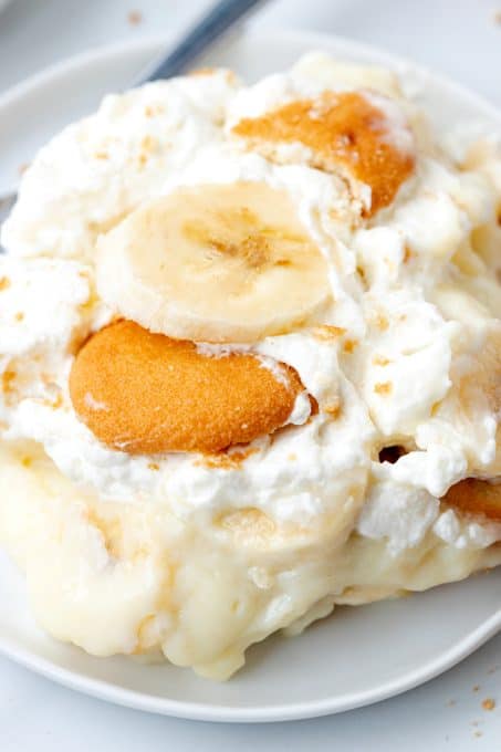 Layers of banana slices, Nilla Wafers, whipped cream and creamy pudding made with bananas.