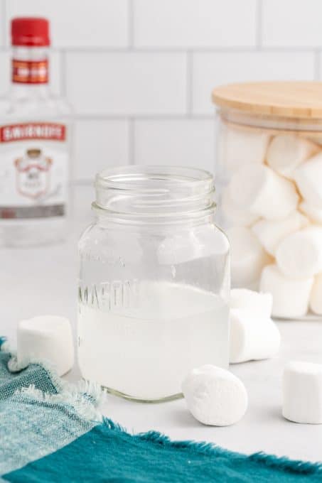 A jar of vodka flavored with marshmallows.