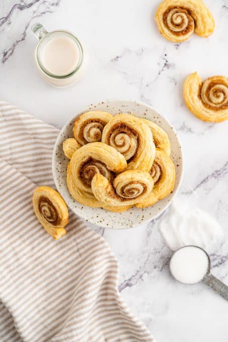 A plate of Cinnamon Swirls made of puff pastry.