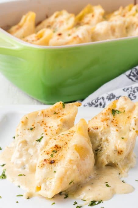 Pasta shells stuffed with chicken and cheese and baked in a garlic Alfredo sauce.