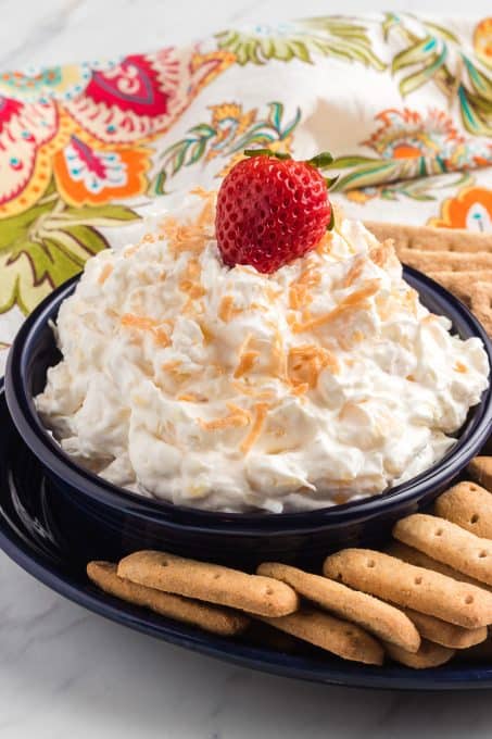 Pineapple, cream cheese, Cool Whip, coconut and rum extract make this easy fruit dip.