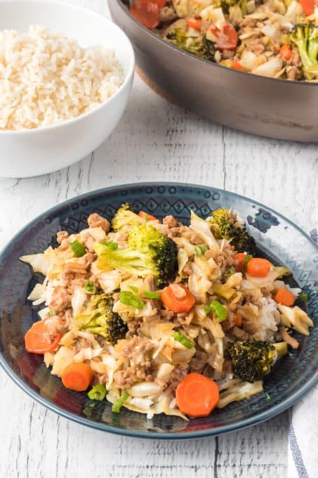 Seasoned pork and cabbage in a savory stir fry dinner.