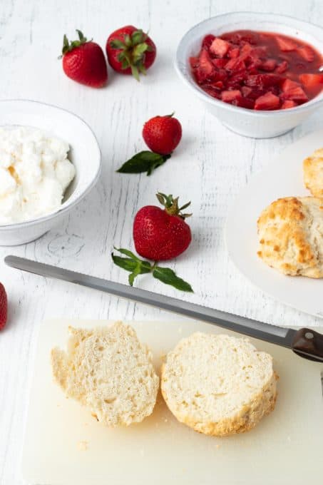 Slicing Bisquick shortcakes.