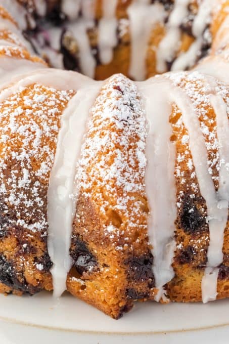 Glaze on a coffee cake with blueberries