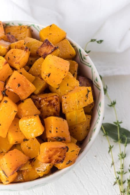 A bowl of butternut squash that's been roasted.