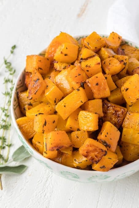 Cooked Butternut Squash with fresh herbs.