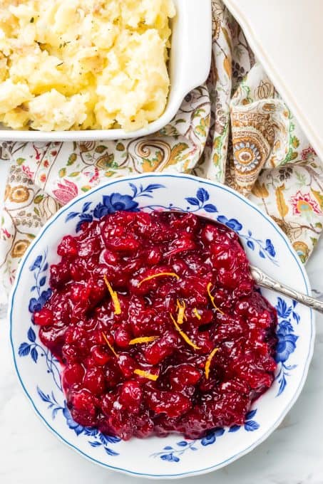 Orange zest and a bowl of cranberry sauce.