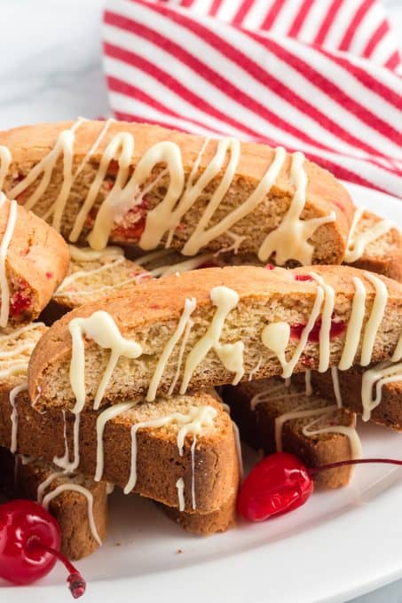 Biscotti drizzled with white chocolate and made with cherries.