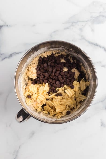 Ready to mix potato chip cookies with chocolate chips.