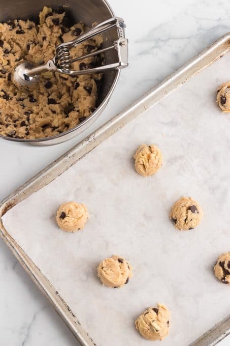 Chocolate chip dough with potato chips ready for the oven.