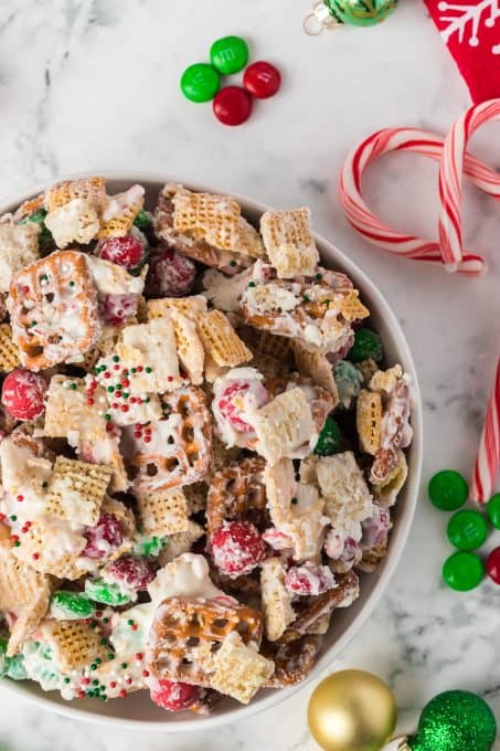 A Christmas Chex Mix with candy.