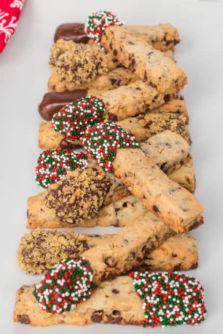 Sticks of decorated chocolate dipped cookies.
