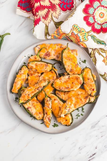 A plate of stuffed jalapenos.