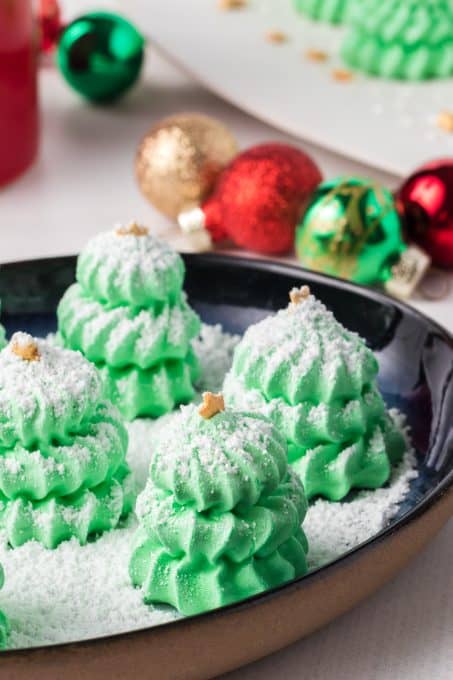 Powdered sugar to look like snow on meringue tree cookies.