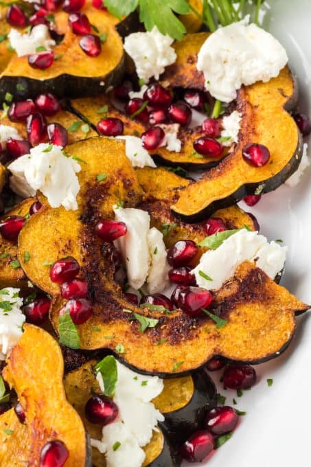 Baked acorn squash, goat cheese, and pomegranate arils.