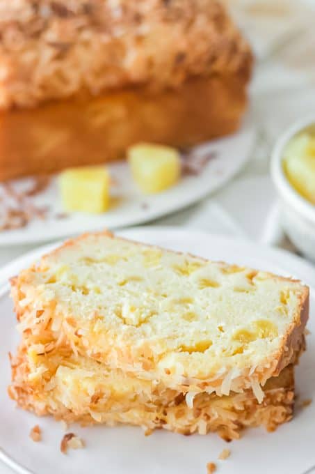 A quick bread made with pineapple and toasted coconut on top.
