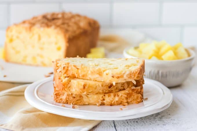 Slices of quick bread with pineapple and toasted coconut.