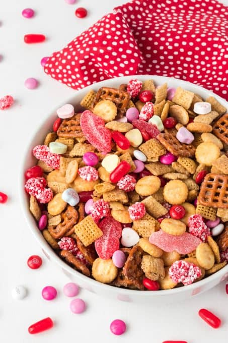Pretzels, Chex cereal, oyster crackers, and Valentine candy make up this easy and fun snack mix.