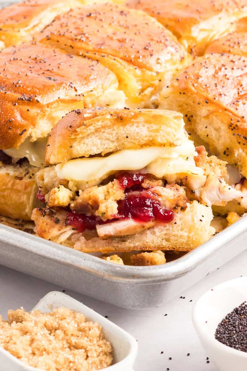 Stuffing, cranberry sauce, turkey and cheese sliders.