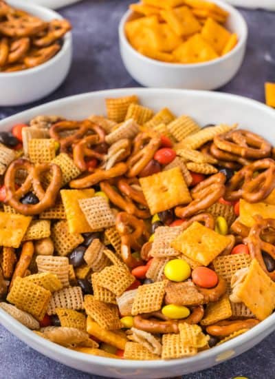 A snack mix made with cereal, crackers, pretzels and candy.