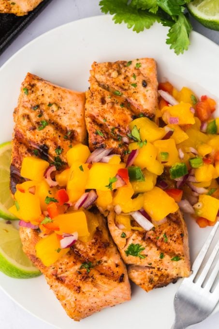 A tropical fruit salsa tops salmon that's been prepared on the grill.